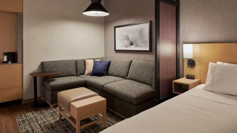 HP P0486 Guestroom Cozy Corner Sofabed With Coffee Mug.16x9 768x432