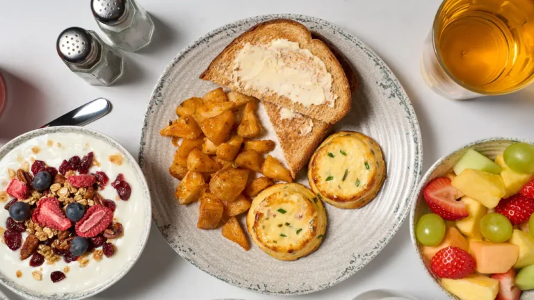 HP P0591 Breakfast Egg Bites With Potatoes Fruit And Yogurt Top View.16x9 768x432